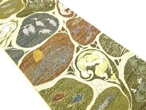 紙布動物に葉模様織出し袋帯